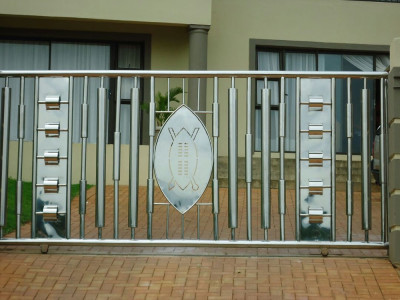 Stainless Steel Sliding Gate Installation With Unique Design
